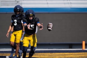 Rich Rodriguez doesn't name WVU football’s starting QB, provides updates on battle